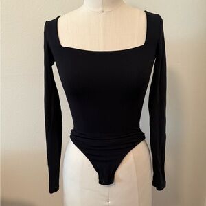 Aritzia Black Asymmetrical Long Sleeve Bodysuit